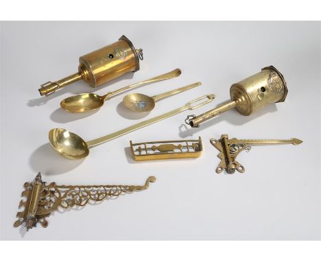 Two brass roasting jacks, two brass swing brackets, two brass spoons, a ladle, a small brass footman (8)