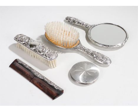 Elizabeth II silver dressing table set, Birmingham 1989, maker W I Broadway & Co, the handles cast with masks and scrolls, co