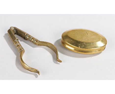 Brass snuff box, of oval form, the lid engraved Ben Smith Doncaster 1720, together with a pair of brass nut crackers, (2)