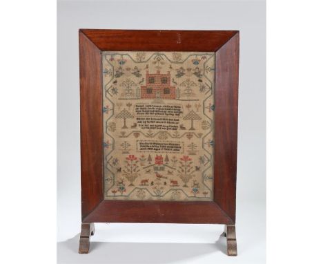 19th Century needlework sampler firescreen, the sampler with central depiction of a country house above a paragraph of verse 