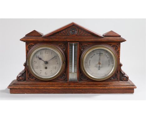 Perken Son & Co Ltd, Hatton Garden, Aneroid barometer, clock and thermometer in an oak case with raised pediment width 51.5cm