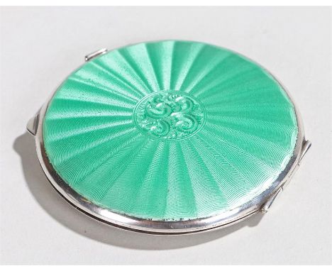 George VI silver compact, Birmingham 1946, maker Joseph Gloster Ltd, with green enamel decorated cover, engine turned reverse