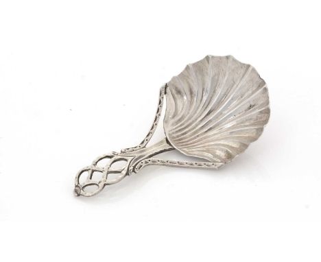 A George III silver Provincial caddy spoon, with an openwork bright-cut stem and fluted shell bowl, by J. Langlands and J. Ro