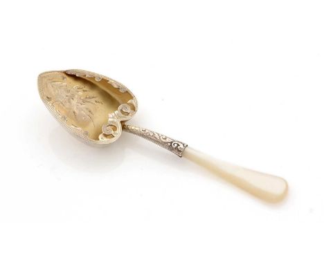 A late Victorian parcel-gilt caddy spoon, with mother-of-pearl stem and a bright-cut, heart-shaped bowl, with pierced lip aro