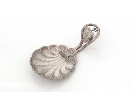 A Victorian caddy spoon, with openwork leaf and tendril stem, a stamped scallop shell bowl, maker's mark 'B &amp; C?, Birming