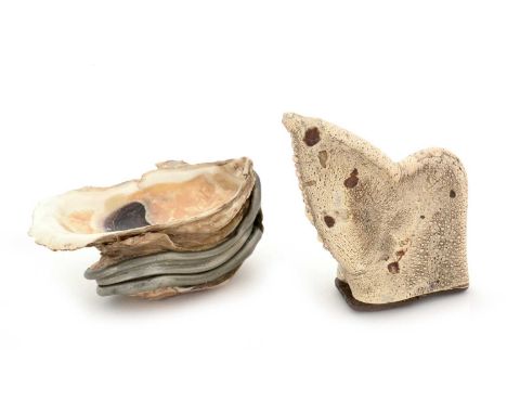 A late 19th Century pewter-mounted oyster shell snuff box, and another, fashioned from part of a lobster or crab claw, wooden