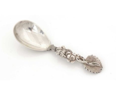 A George IV/William IV silver Provincial caddy spoon, with a plain drop-shaped bowl, a naturalistic cast stem with matted lea