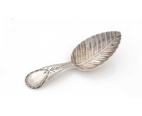 A George III silver Provincial caddy spoon, with leaf-shaped bowl and bright-cut stem, vacant cartouche, by Richard Ferris of