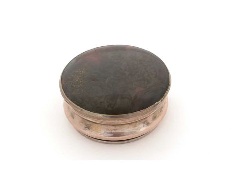 An early period Old Sheffield plated circular snuff box, with an inset tortoiseshell cover and base, c.1760, 7cms diameter.