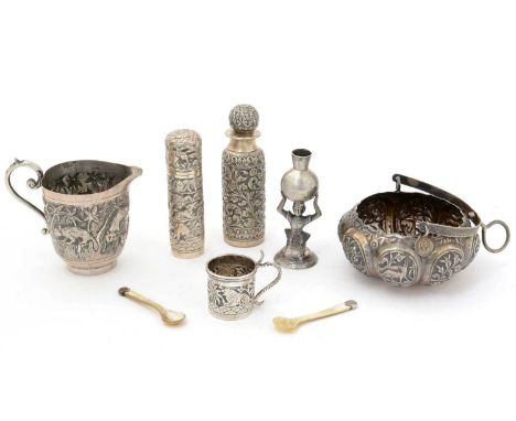 Indian/Burmese silver: a small bowl with swing handle; a small jug; a stoppered bottle; a small bottle and cover; a small tot