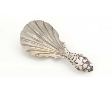 A George III silver caddy spoon, with fluted and waisted bowl, an engraved openwork stem, initialled "D", probably by William