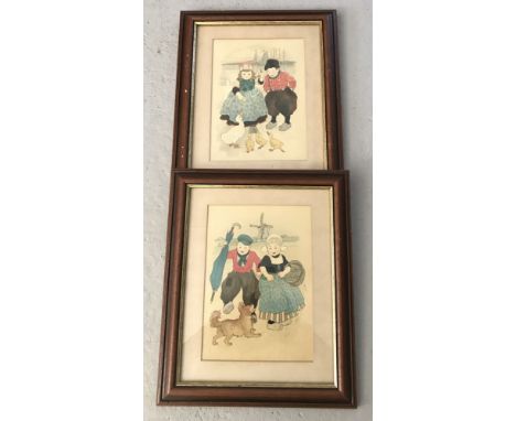 A pair of vintage framed and glazed coloured prints depicting scenes with Dutch Children.  Frame size approx. 36cm x 29.5cm.
