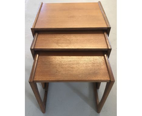 A vintage nest of 3 teak tables.  Largest approx. 49cm tall x 53.5cm wide x 43cm deep.