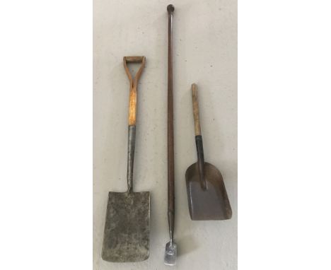 An early 20th century thistle spud with Harrison makers mark and a turned and polished wooden handle Together with a vintage 