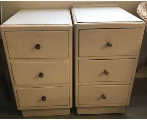 2 vintage 3 drawer bedside cabinets painted cream with Formica tops.  