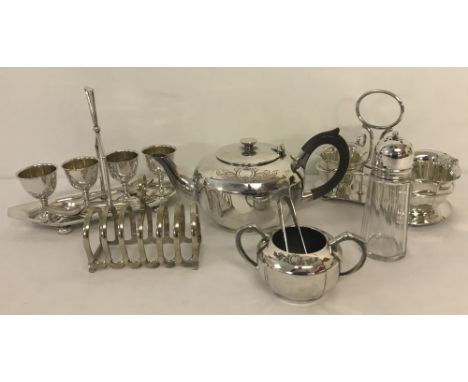 A vintage Art Deco style silver plated boiled egg set with spoons. Together with a number of other silver plated items, inclu