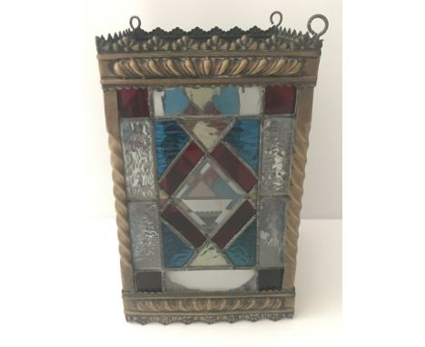 A  vintage metal framed decorative stained glass lampshade.  