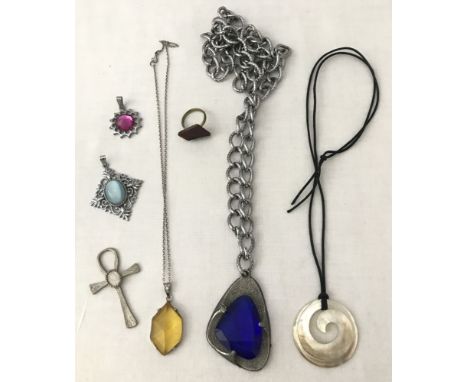 A small collection of vintage jewellery items. To include stone set necklaces and pendants.  