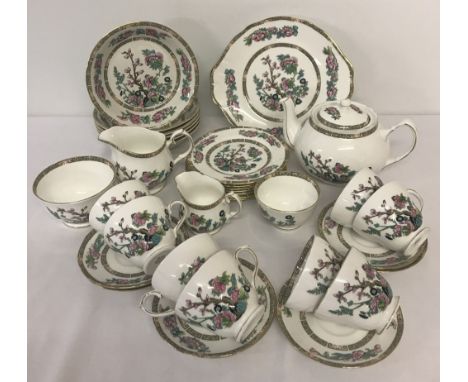 A 34 piece Indian Tree tea service, 28 pieces by Duchess &amp; fruit bowls by Maddock. Comprising teapot, 2 milk, 2 sugar, 8 