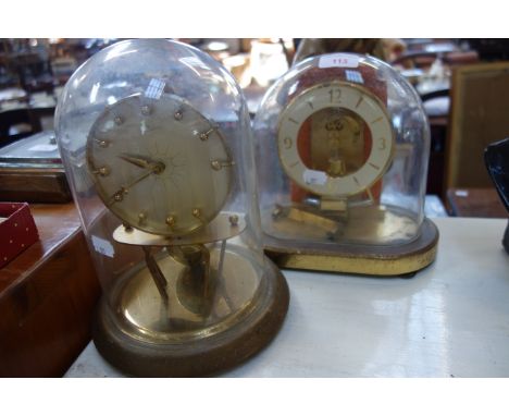 A VINTAGE KAISER CLOCK under a glass dome, with 'terrestrial' globe and a similar mantel clock (2) 