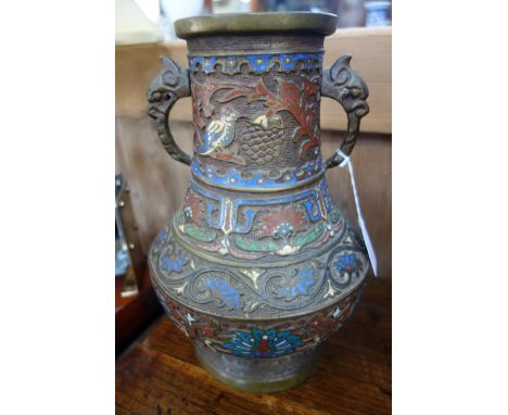 AN ORIENTAL BRASS VASE with enamel decoration, 30cm high 