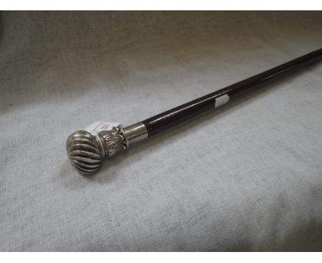 A WALKING STICK with silver 'reverse' tulip and Wrythen knob £30-50