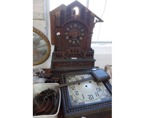A 19TH CENTURY BLACK FOREST CUCKOO MANTEL CLOCK and an early 20th century wall clock (2) (in need of restoration) 