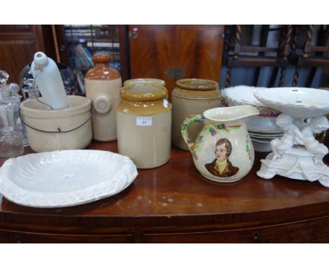 A COLLECTION OF STONEWARE STORAGE JARS, ceramics, a glass rolling pin and similar glassware 