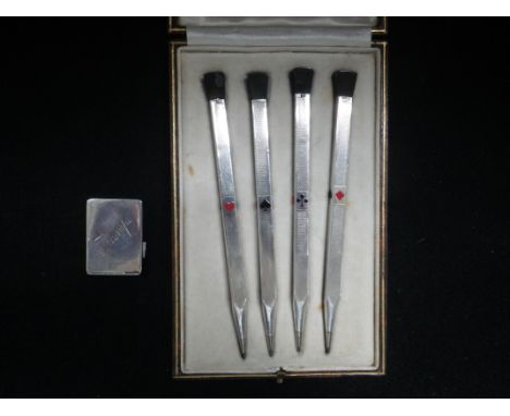 A CASED SET OF GOLDSMITHS AND SILVERSMITHS BRIDGE PENCILS, with enamel suits, stamped 935, and a small silver "trumps" holder