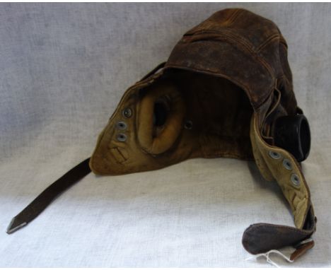 A VINTAGE LEATHER FLYING HELMET 