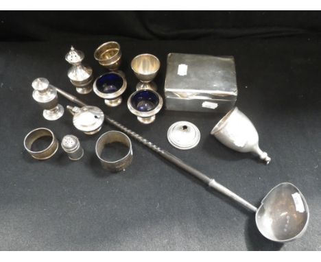 A COLLECTION OF MIXED SILVER, comprising a Goldsmiths and Silversmiths cigarette box, napkin rings, condiment set, toddy ladl
