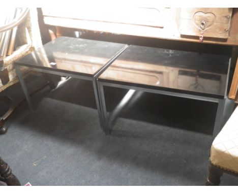 THREE POST WAR BLACK LACQUERED AND ALUMINIUM FRAMED occasional tables, each of rectangular form, comprising a coffee table an