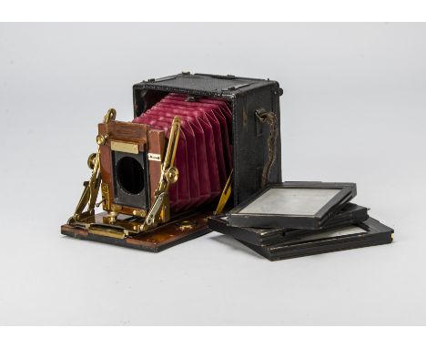 A Houghton Sanderson Hand and Stand Camera, quarter plate, mahogany, circa 1903, double extension, red leather bellows, body,