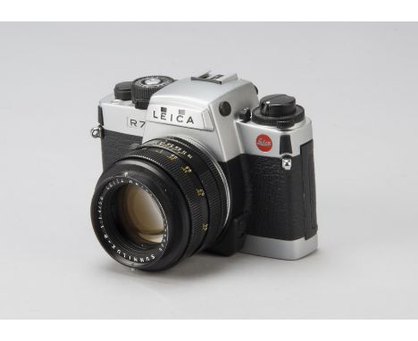 A Leica R7 Camera, chrome body No 1924430,  cosmetics: G, shutter working on manual setting but untested, 50mm F1.4 Summilux 