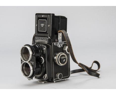 A Tele-Rolleiflex Model I TLR Camera, serial no. 2300774, black, shutter working, body, G, with Heidosmat 135mm f/4 viewing l