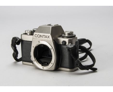 A Contax (Kyocera) S2 SLR Camera,  serial no. 025815, titanium finish, shutter working, G-VG, scratch to baseplate, with make