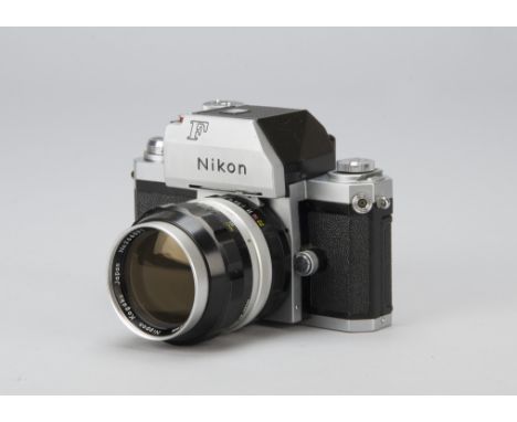 Nikon Ftn SLR Camera, serial no. 7085847, shutter working , with a Nikkor-P 105mm f/2.5 lens, no. 266091, complete with lens 