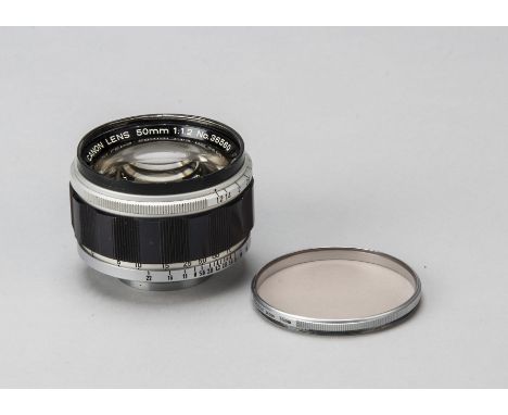 A Canon 50mm f/1.2 Lens, serial no. 36560, LTM 39 mount, black and chrome, barrel, G, minor paint degradation to front rim, e