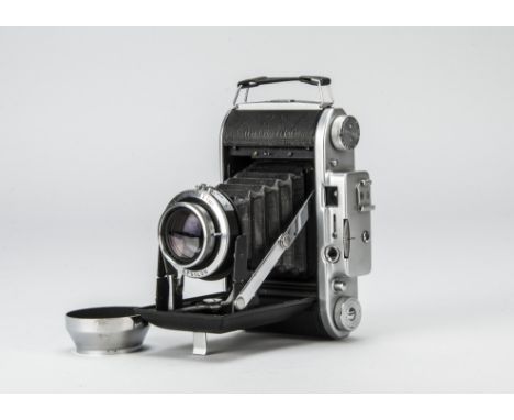 A Houghton Ensign Selfix 820 Special Folding Camera, chrome, 1953, shutter working, body VG-E, with Ross Xpres 105mm f/3.8 le