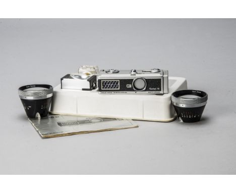 A Rollei 16 Outfit, serial no. 2713197, chrome, shutter working, body, F-G, some light marks to chrome, with a Carl Zeiss Tes