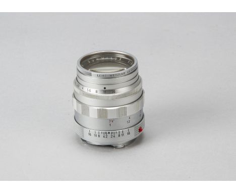 A Leitz Summilux 50mm f/1.4 Lens, serial no. 1702989, chrome, first version, 1959, barrel, G-VG, elements, G, very light fung