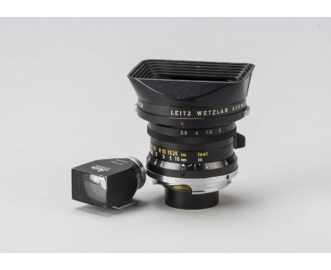 A Leitz Wetzlar Elmarit I f/2.8 28mm Lens,  serial no. 2063294, black, early first version, with 12501 M lens hood, barrel, G