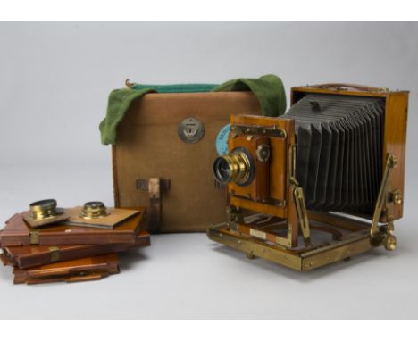 A Thornton Pickard Mahogany and Brass Triple-Extension Field Camera, half-plate, roller blind shutter, three mahogany DDS, ci