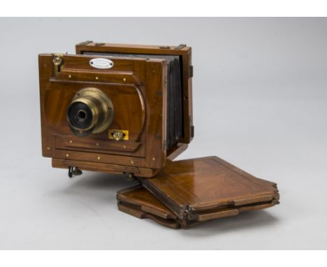 A early J Lancaster Half-Plate Instantograph Camera,  mahogany and brass, 1882, square bellows, demountable portrait oblique 