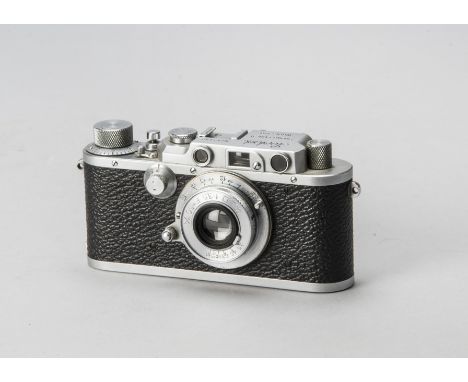 A Showa Kogaku Leotax D IV Rangefinder Camera, serial no. 12449, chrome, shutter function intermmitent, body G-VG, light mark