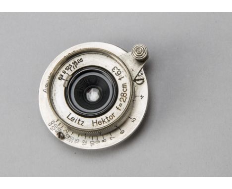 A Leica 2.8cm Hektor Lens, nickel type with feet focus scale, no. 273921, body G-VG, elements G, build up of surface dirt int