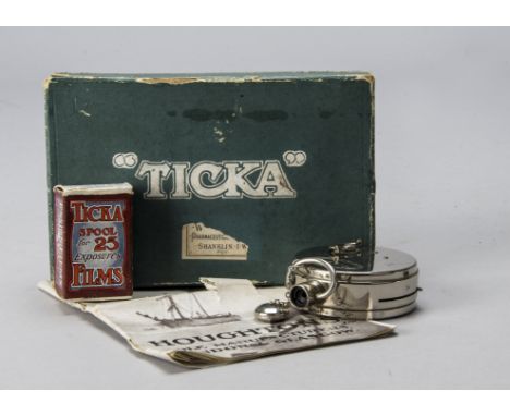 A Houghton Ticka Camera, nickel-plated, 25mm f/16 achromatic lens, for ? x ?" exposures, body G, missing attachable viewfinde