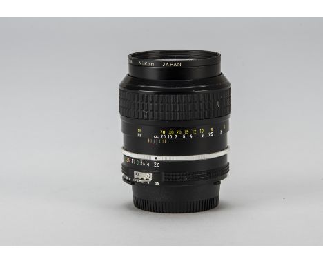A Nikon Nikkor 105mm f/2.5 Lens, AI, serial no. 893941, black, barrel, VG, light marks to focusing ring, elements, F-G, light