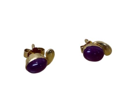 Yellow gold (tests as 18ct) natural ruby cabachon stud earrings.&nbsp; Weight each ruby approx just under 1ct.&nbsp; Total we