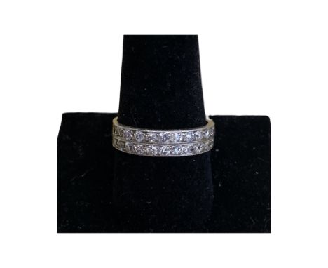 18ct gold double row of diamonds half eternity ring. Size W. Approx weight 5.6 g. Total diamonds 24. Weight of each diamond a